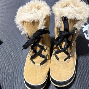 Sorel Tan and Black Winter Boots